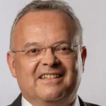 Gerald Hauser Urged to Intervene in Belgiangate